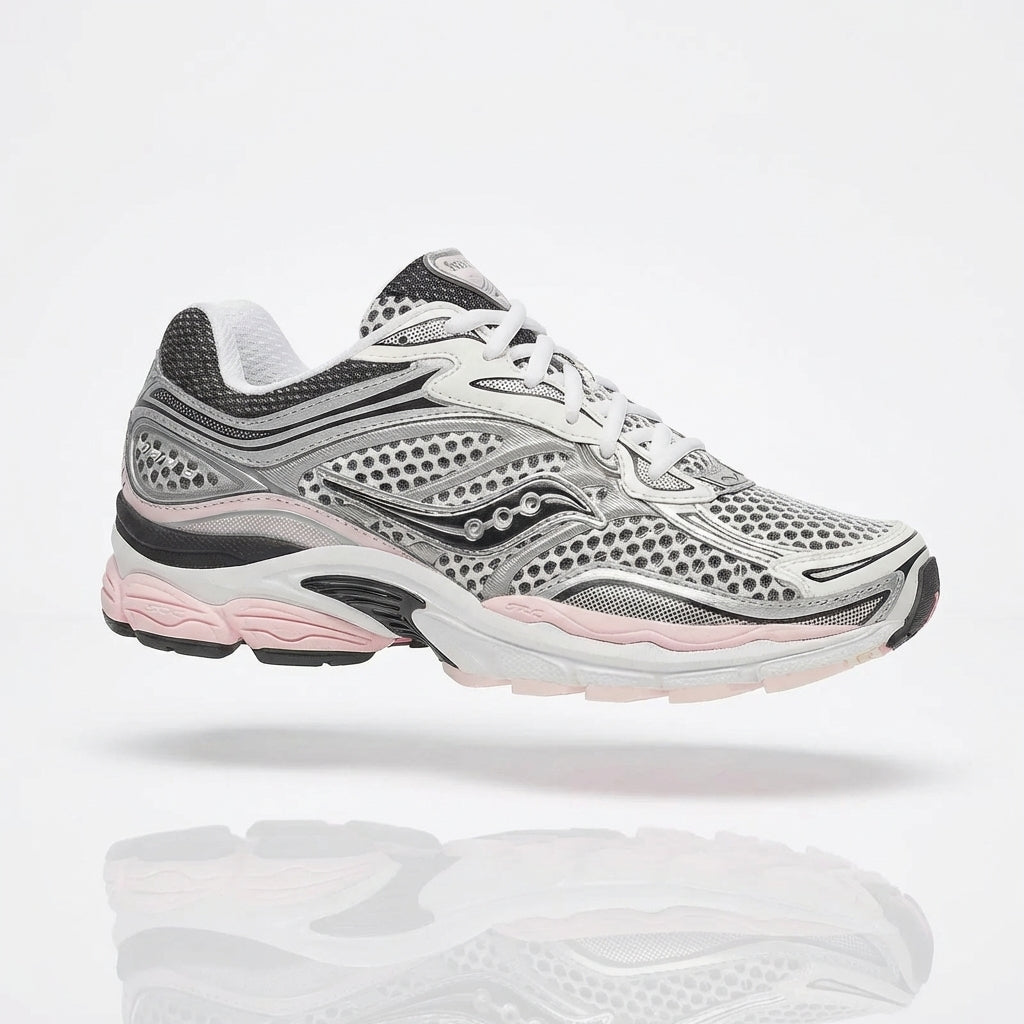 Saucony ProGrid Omni 9 Silver Pink sneaker, 3/4 side view showing silver metallic mesh upper with charcoal overlays and pastel pink midsole