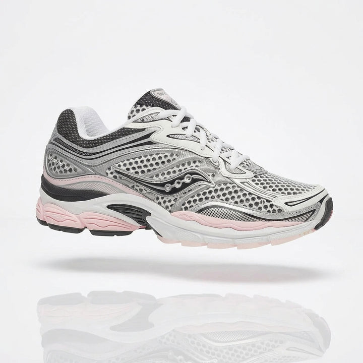 Saucony ProGrid Omni 9 Silver Pink sneaker, 3/4 side view showing silver metallic mesh upper with charcoal overlays and pastel pink midsole